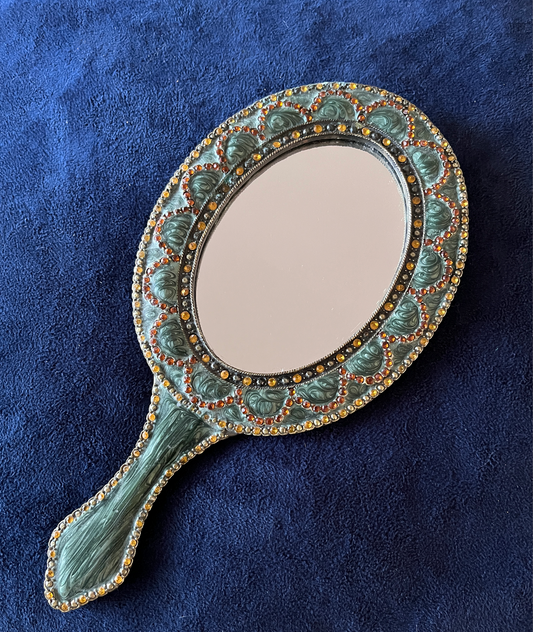 Hand Mirror and Necklace